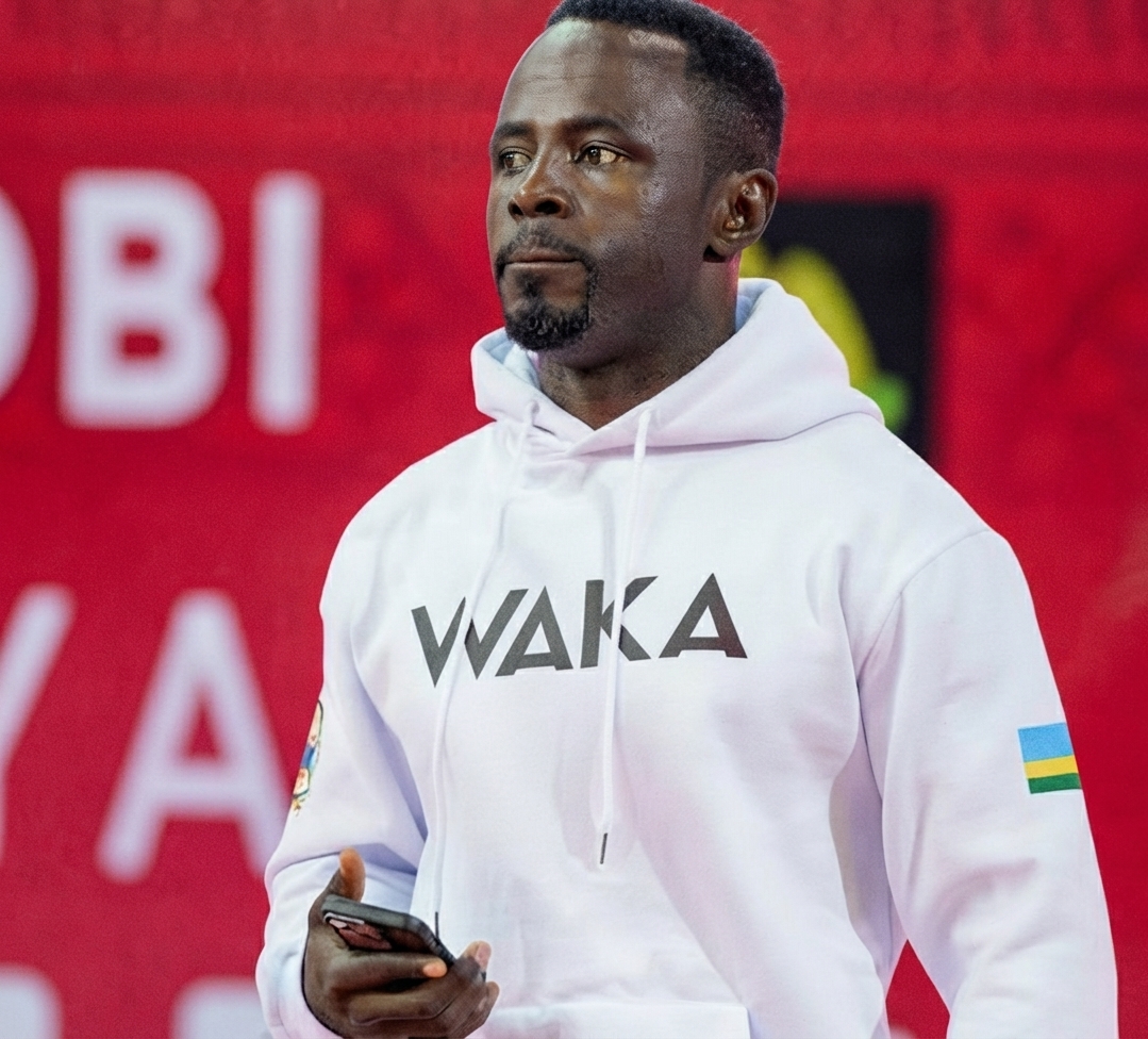 Joel Wawina on stage in team hoodie